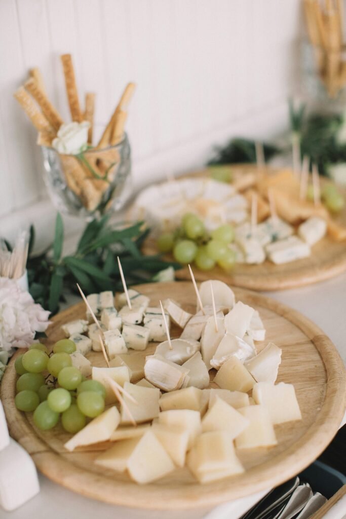 pexels-photo-1741284-1741284 Chic cheese platters with grapes and crackers, perfect for sophisticated gatherings.